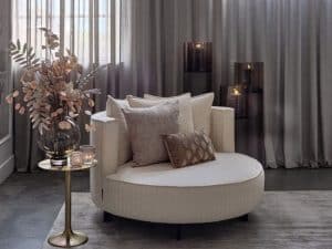 Adèle Sky loveseat upholstered in Cruso 05 fabric in beige sand tone, available at Room 108