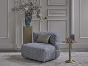 Lois armchair upholstered in Terni 01 fabric with beige and teal tones, available at Room 108