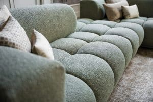 Oriana corner sofa in greenish fabric, available at Room 108