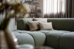 Oriana corner sofa in greenish fabric, available at Room 108